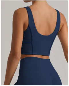 Ensemble soutien-gorge de sport et leggings bleu foncé, design dos U pour le yoga et entraînement.