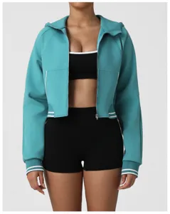 Teal zip-up hooded jacket activewear set with crop top and shorts for fitness and casual wear.