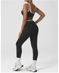Gedetailleerd uitzicht zwarte fitness yoga set crop top en hoge taille leggings voor dames