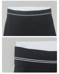 Gedetailleerd overzicht van de dames yoga broek met contrasterende tailleband, elastisch.