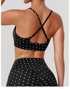 Ensemble soutien-gorge de sport et leggings de yoga à pois argentés, bretelles croisées.
