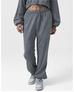 Grey acid wash cropped sweatshirt and loose sweatpants set, comfortable casual activewear.