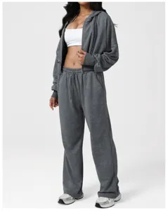 Detailed view of the vintage wash grey zip up hoodie and wide leg sweatpants tracksuit set.