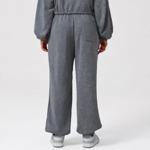 Grey high-waisted casual sweatpants with elastic cuffs, comfortable fit for sports and daily wear.
