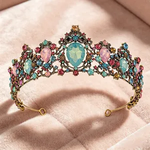 Detailed view of a vintage gold bridal tiara featuring colorful crystal rhinestones