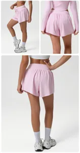 Pink high waist athletic shorts detail, loose fit casual fitness yoga sportswear pants.