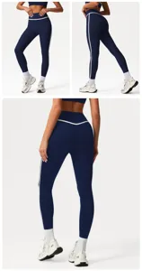 Detailed view of high-waisted athletic yoga leggings with contrast piping and flattering fit.