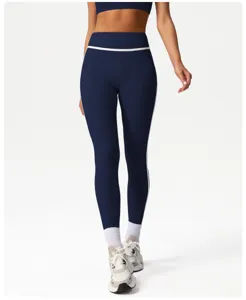 High waist detail and contrast white side stripe of navy blue stretch yoga fitness pants.