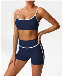 Colorblock yoga shorts set with supportive sports bra and high waist design for gym fitness.