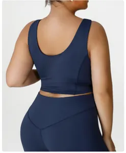 Plus size activewear sports bra in solid navy blue, offering high elasticity and support for yoga.