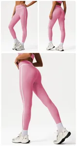 Pink high waist yoga pants with white side stripes, butt lifting fitness leggings for gym.