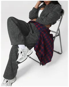 Close-up of acid wash hoodie and sweatpants set detail, showcasing casual sportswear texture.