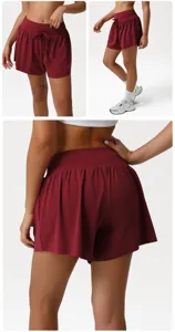 Women high waist pleated athletic shorts for running yoga gym fitness workout activewear.