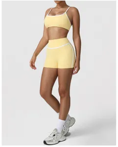 Women contrast color yoga set activewear high waist sports bra and shorts for fitness.
