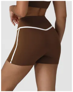 High-waist nude-feel yoga shorts with contrast piping for fitness and gym workout activewear.