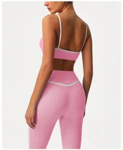 Pink activewear set back detail, high waist yoga leggings and sports bra for fitness running gym.