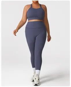 Plus size yoga set detail, breathable high waist leggings and sports bra for workout.