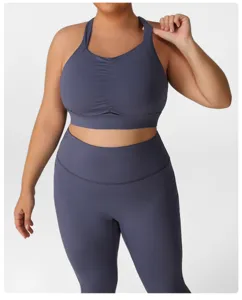 Plus size yoga set detail featuring grey blue sports bra and high waist fitness leggings.
