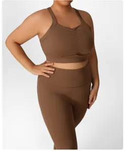 Plus size brown sports bra leggings set detail view, comfortable stretch activewear.