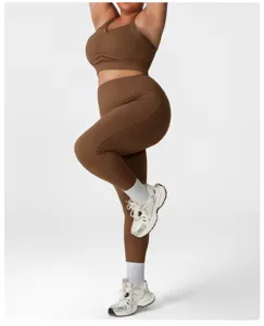 Detailed view of plus size brown yoga set featuring high waist leggings and supportive sports bra.