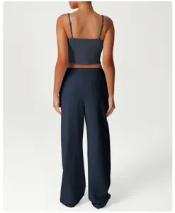Women's casual athletic two-piece set with crop top and high waist wide leg pants.