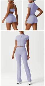 Completo sportivo lavanda con top con zip e pantaloni yoga a zampa per il fitness.