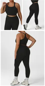 Plus size activewear set for women, black sports bra and high waist yoga leggings.