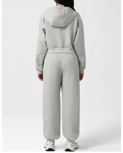 Back view detail of the comfortable grey casual hooded sweatshirt and matching pants set.