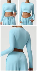 Light blue long-sleeve crop top and pants yoga set, skin-friendly and breathable fitness wear.
