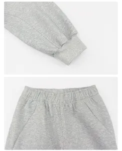 Gray fleece hoodie cuff and sweatpants elastic waist detail shot for winter casual wear sports apparel