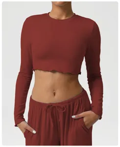 Detail view of a skin-friendly breathable slim fit long sleeve crop top for yoga and fitness workout.