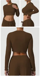Brown long sleeve crop top detail showing crew neck, lettuce edge trim and matching lounge pants.