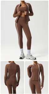 Nahaufnahmen des braunen Sportbekleidungssets mit Kontrastpaspeln und Reißverschluss.