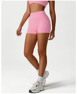 Women pink high waist fitness shorts, quick dry tummy control sports running biker shorts detail.