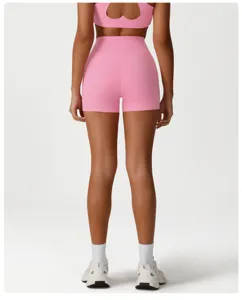 Detail shot of women high waist pink sports fitness shorts back view quick dry fitness wear
