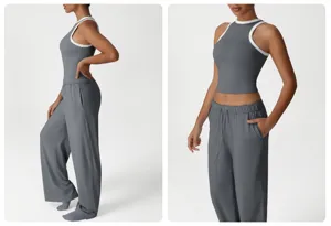 Detailansicht des sportlichen Zweiteilers für Damen mit grauem Trägerstop und weiten Hosen.