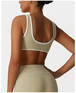Soutien-gorge de sport de yoga kaki avec bordure blanche, crop top fitness élastique.
