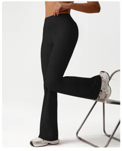High-waisted black flare yoga pants, stretchy workout fitness active leggings for women.