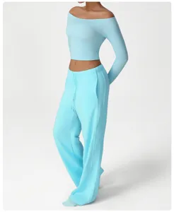 Light blue casual long sleeve crop top and loose wide leg sweatpants set for yoga and fitness.