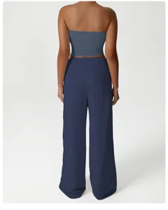 Back view of loose wide-leg casual sports pants with back pocket and elastic waist.
