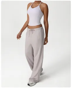 Detailed view of the comfortable loose wide-leg sweatpants and casual sports top set.