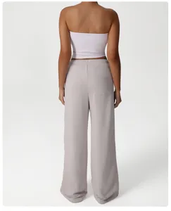 Back view of casual loose wide-leg sweatpants detail showcasing elastic waist and back pocket.