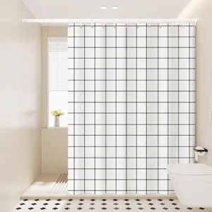 Minimalist black and white grid waterproof shower curtain for modern bathroom dry and wet separation.