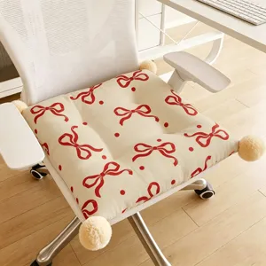 Charming bow pattern seat cushion detail, thick non-slip office chair pad with cute pom poms.