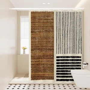 Close-up detail view of the geometric line shower curtain installed in a modern bathroom.