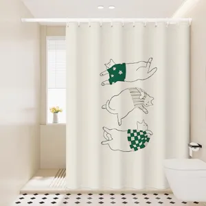 Gros plan sur le rideau de douche beige avec motif de chats mignons dans la salle de bain.