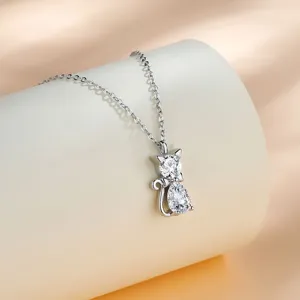 Cute silver cat pendant necklace with sparkling cubic zirconia crystals.