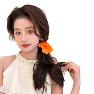 Jolie pince a cheveux fleur d'hibiscus orange accessoire de vacances d'ete pour femme