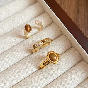 Vintage Gold Tigerauge Ringe Set mit funkelnden Zirkoniasteinen in edler Schmuckbox.