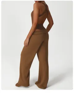 Stylish brown sleeveless bodysuit paired with loose straight casual yoga pants for women.